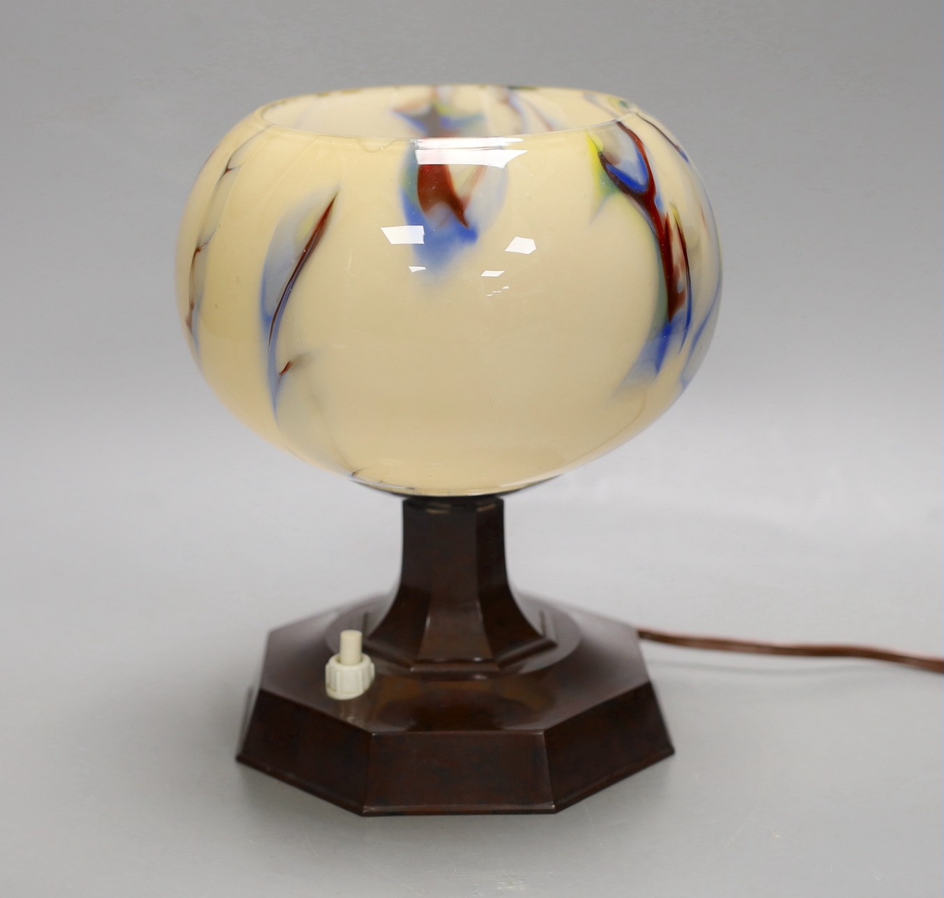 An Art Deco bakelite and glass lamp. 18cm high